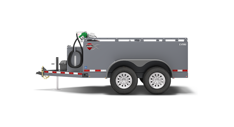 Economy Value Fuel and Service Trailer in stainless steel fits 990 gallons of fuel parked in a side view with a green fuel pump on top of the trailer.
